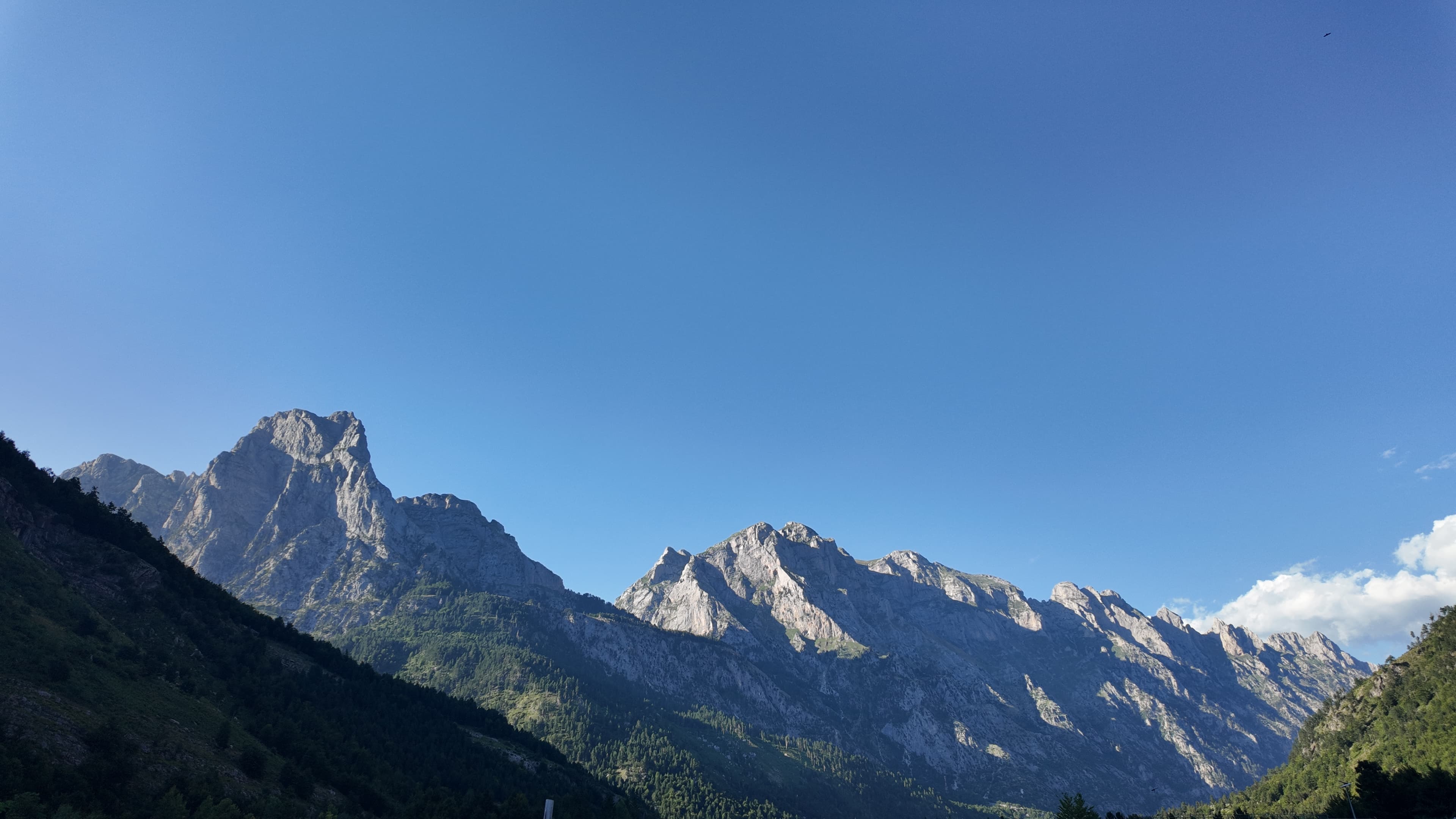 The Albanian Alps beneath a clear blue sky
